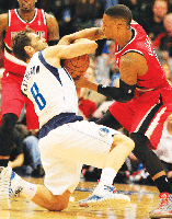 Road in Dallas rough: Blazers fall, 103-98