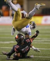 Huntley throws for 4 TDs, Utah rolls to 48-17 win over UCLA