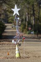 Pothole Christmas tree inspires pastor to write holiday song